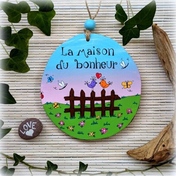 rondelle bois peint oiseaux sur barrière
